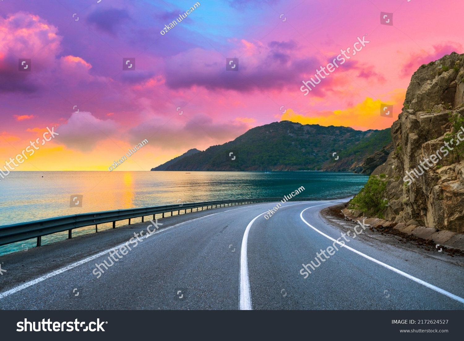 highway landscape at colorful sunset. Road view on the sea. colorful seascape with beautiful road. highway view on ocean beach. coastal road in europe. Colorful seascape in the Mediterranean. #2172624527