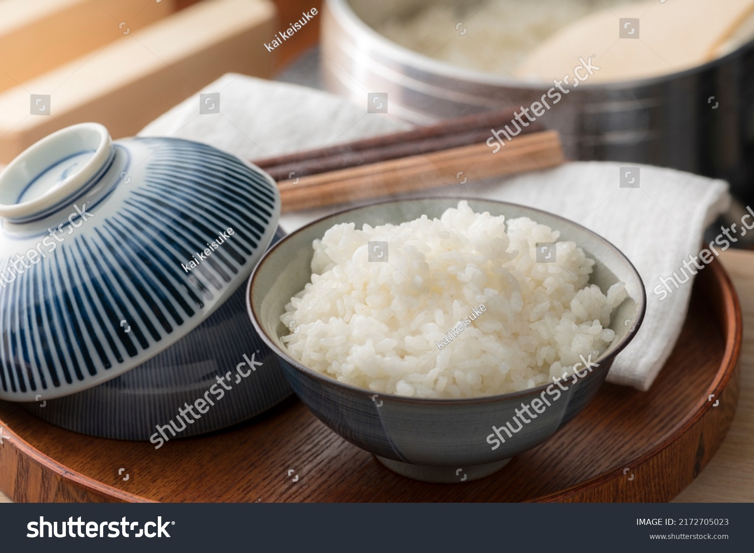 Cook rice in a traditional Japanese rice cooker, Hagama. #2172705023