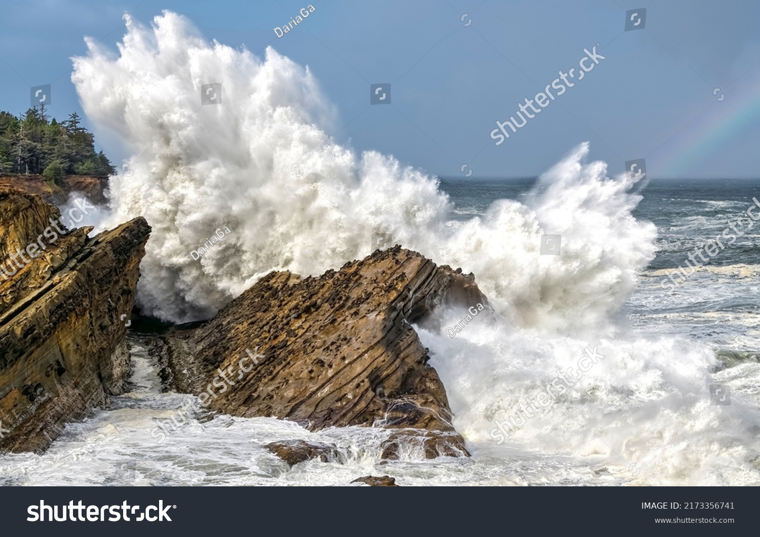 Surf waves on rock. Sea rock with surf waves #2173356741