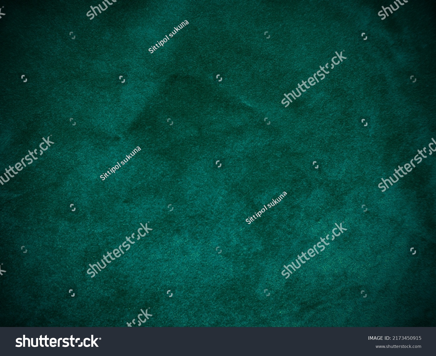 Dark green old velvet fabric texture used as background. Empty green fabric background of soft and smooth textile material. There is space for text.	 #2173450915