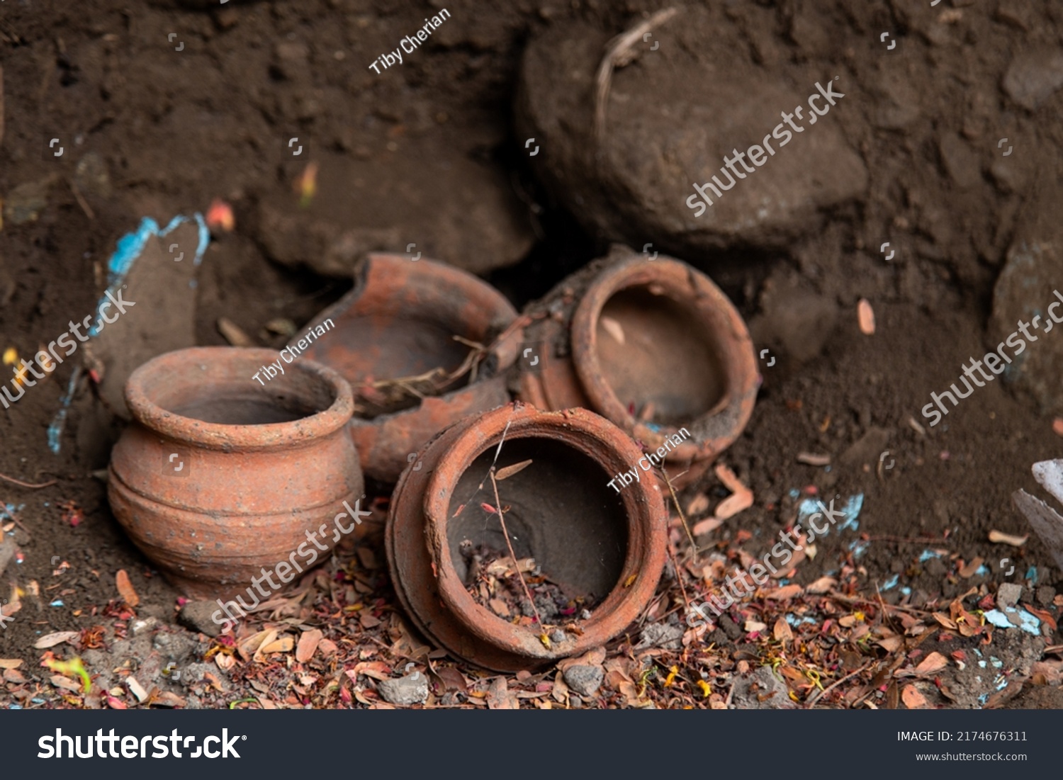 Small broken Clay pots along the roadside #2174676311