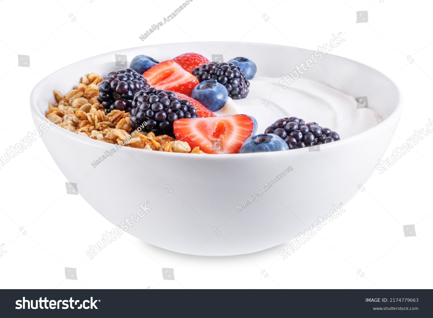 Fresh breakfast with greek yogurt nuts oatmeal granola with berries in a bowl on a white isolated background. the toning. selective focus #2174779663