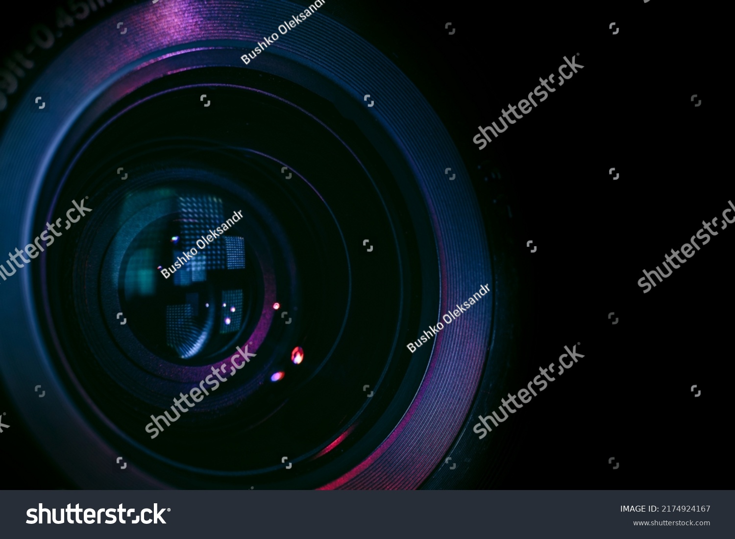 Close up Beautiful camera lens with multi colored light. Background pattern for design.	 #2174924167