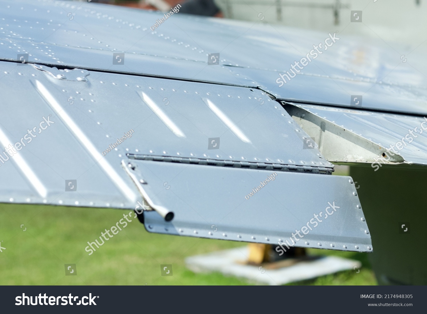 Close up image of an airfoil of an old aircraft #2174948305