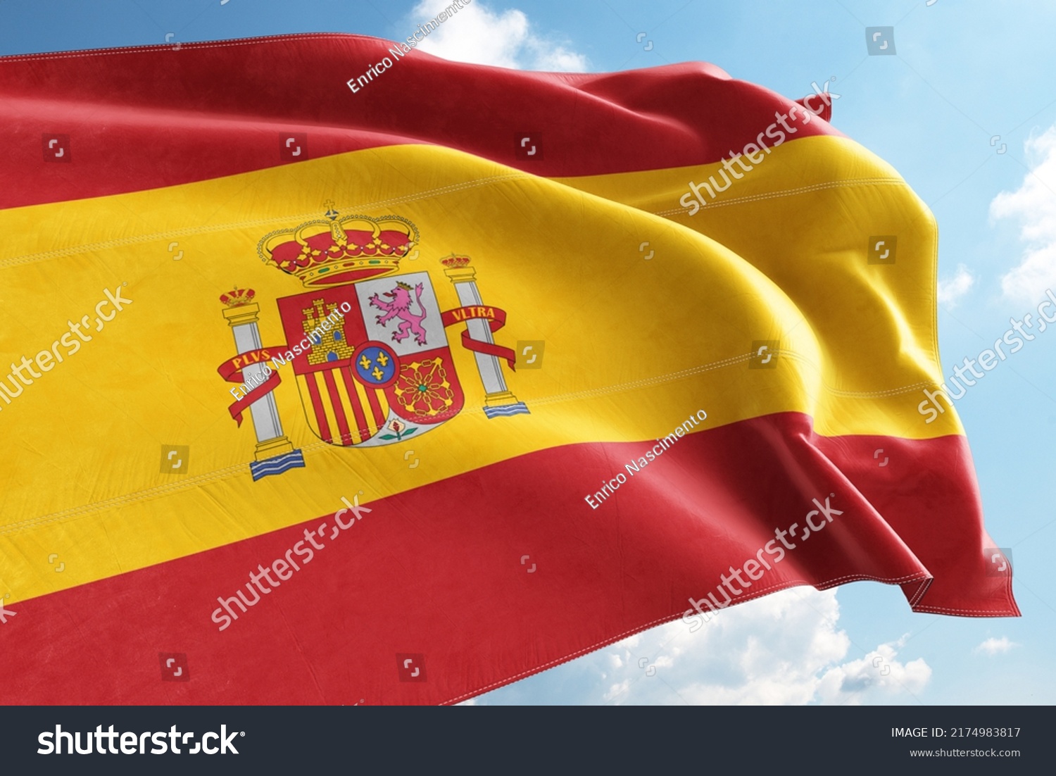 Spain Flag Waving in the Wind on Flagpole, on sky background #2174983817