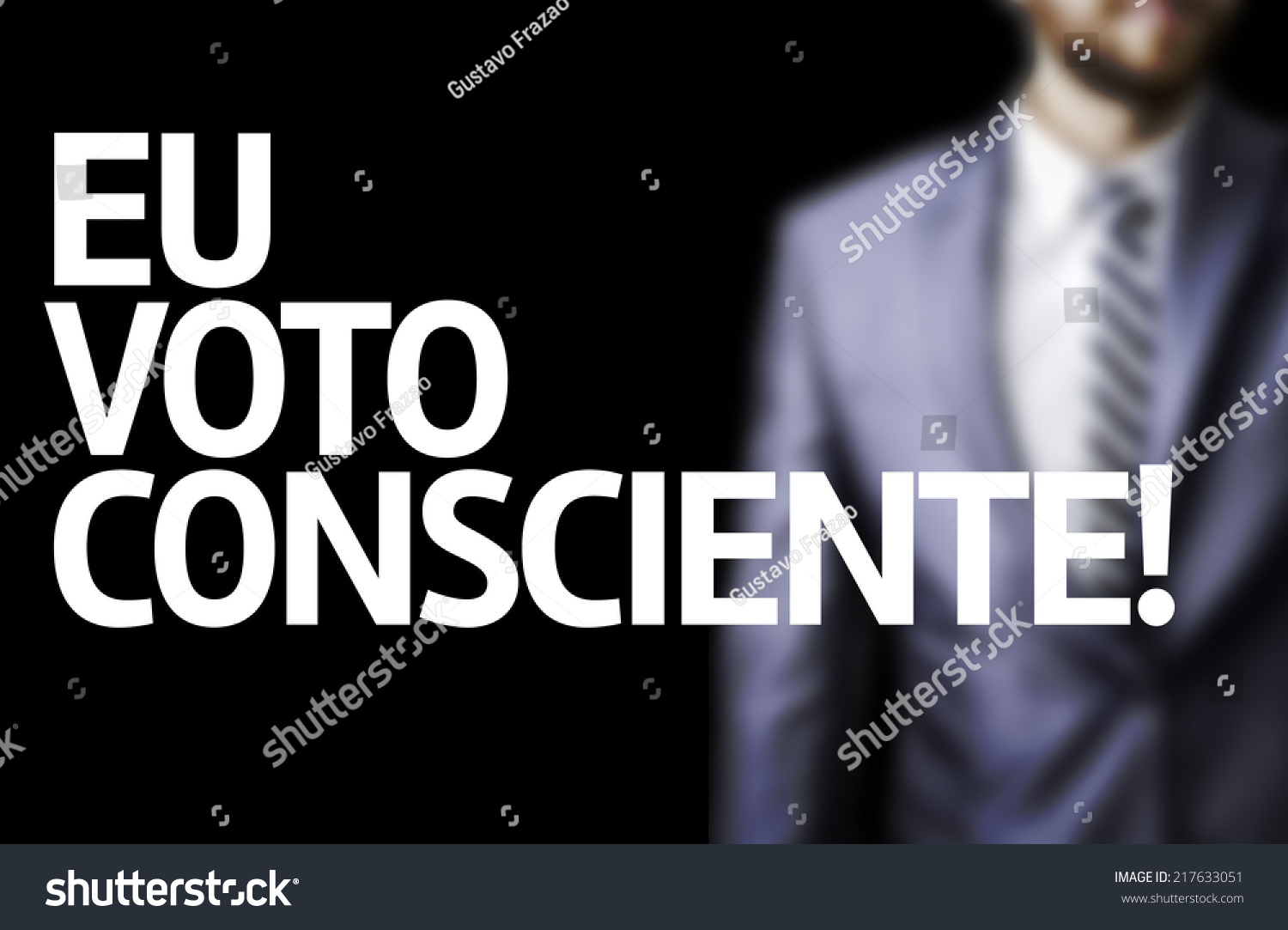 I Vote Conscientiously (In Portuguese) written on a board with a business man on background #217633051