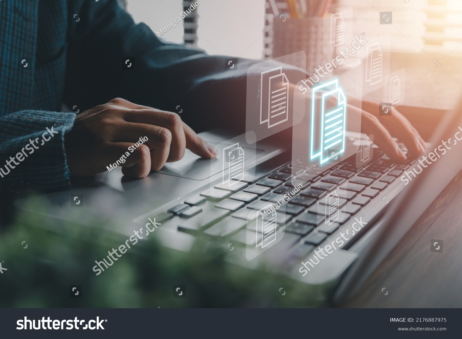 Business woman hand using laptop computer with document management icon, Document management data system business internet technology concept.	

 #2176887975