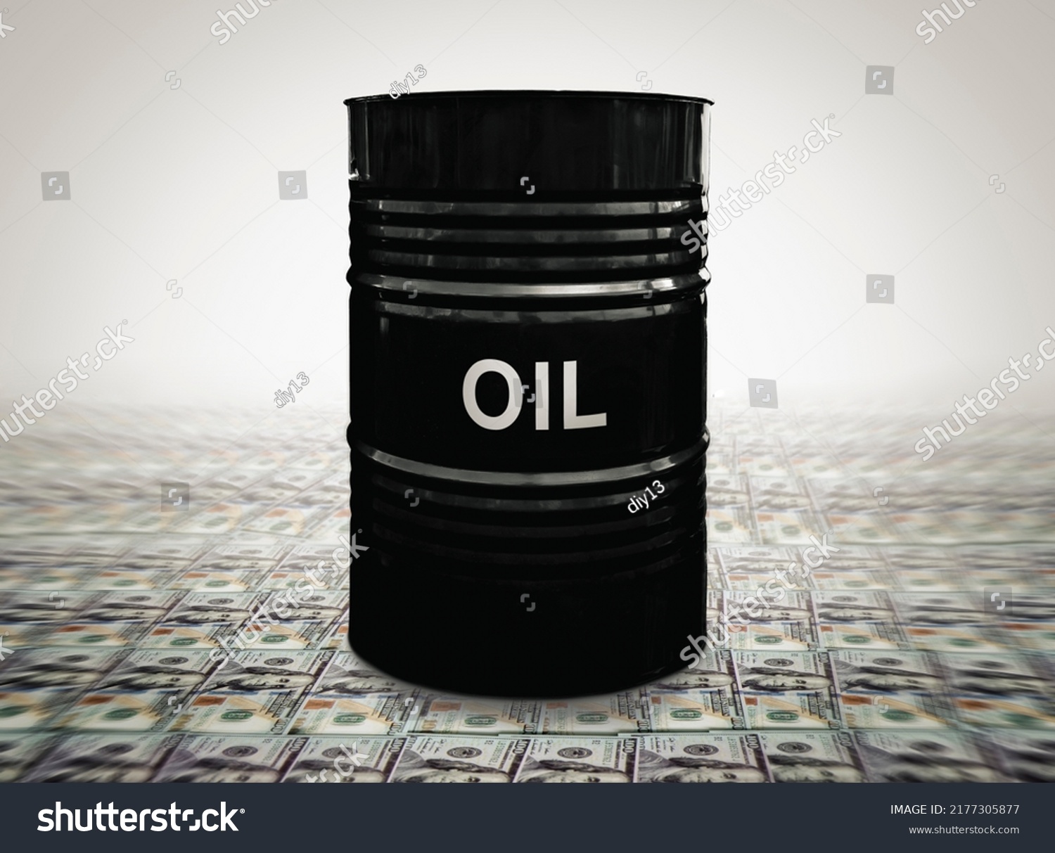 Oil drums on US dollars background. a black barrel with the inscription oil is worth dollars. The concept of earning money on the sale of oil. #2177305877