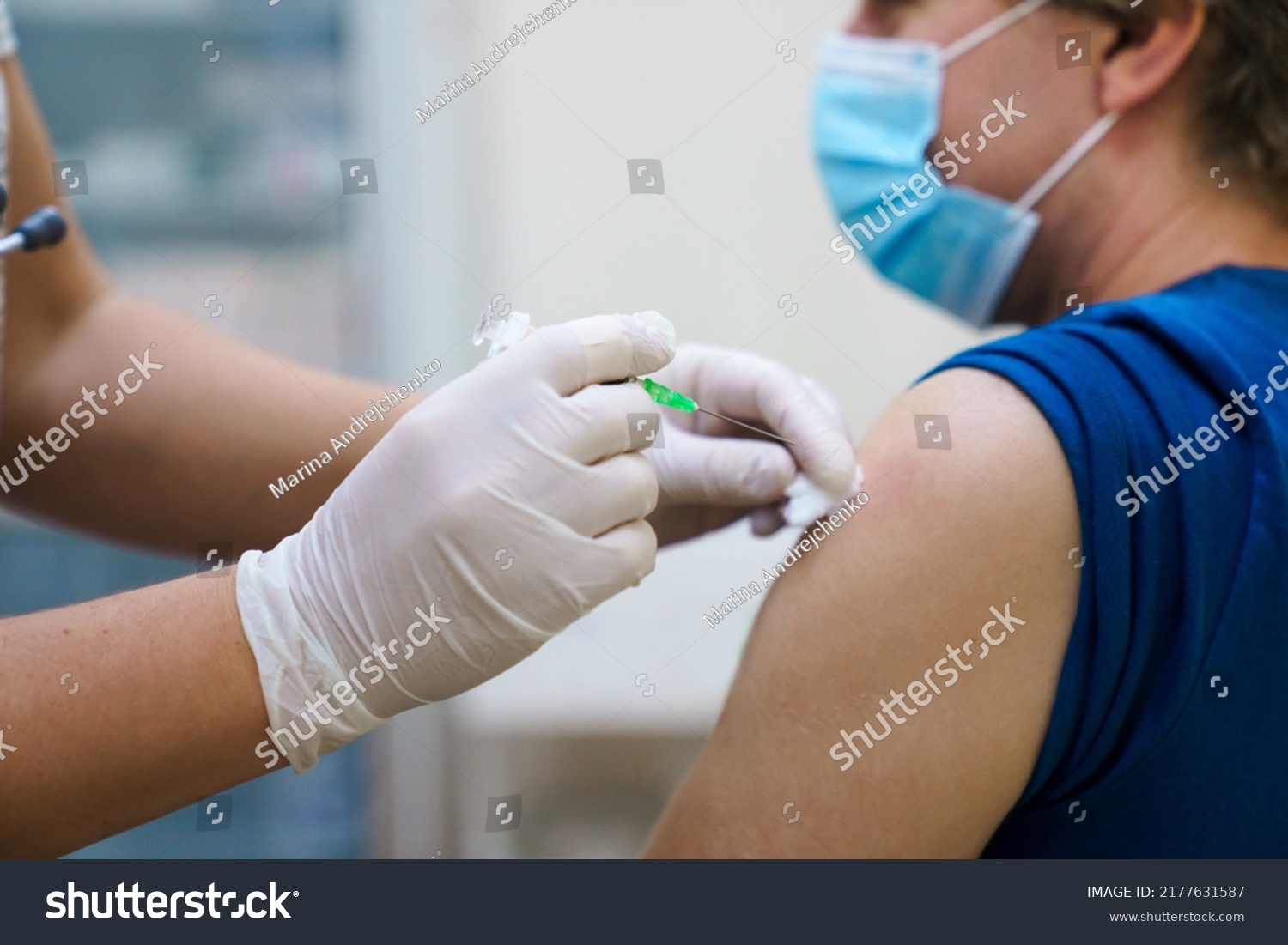 Man getting vaccinated against covid. Vaccination routine, adult immunization schedule. Seasonal virus protection, monkeypox vaccine. Outbreak disease prevention. Medical nurse hold injection syringe #2177631587