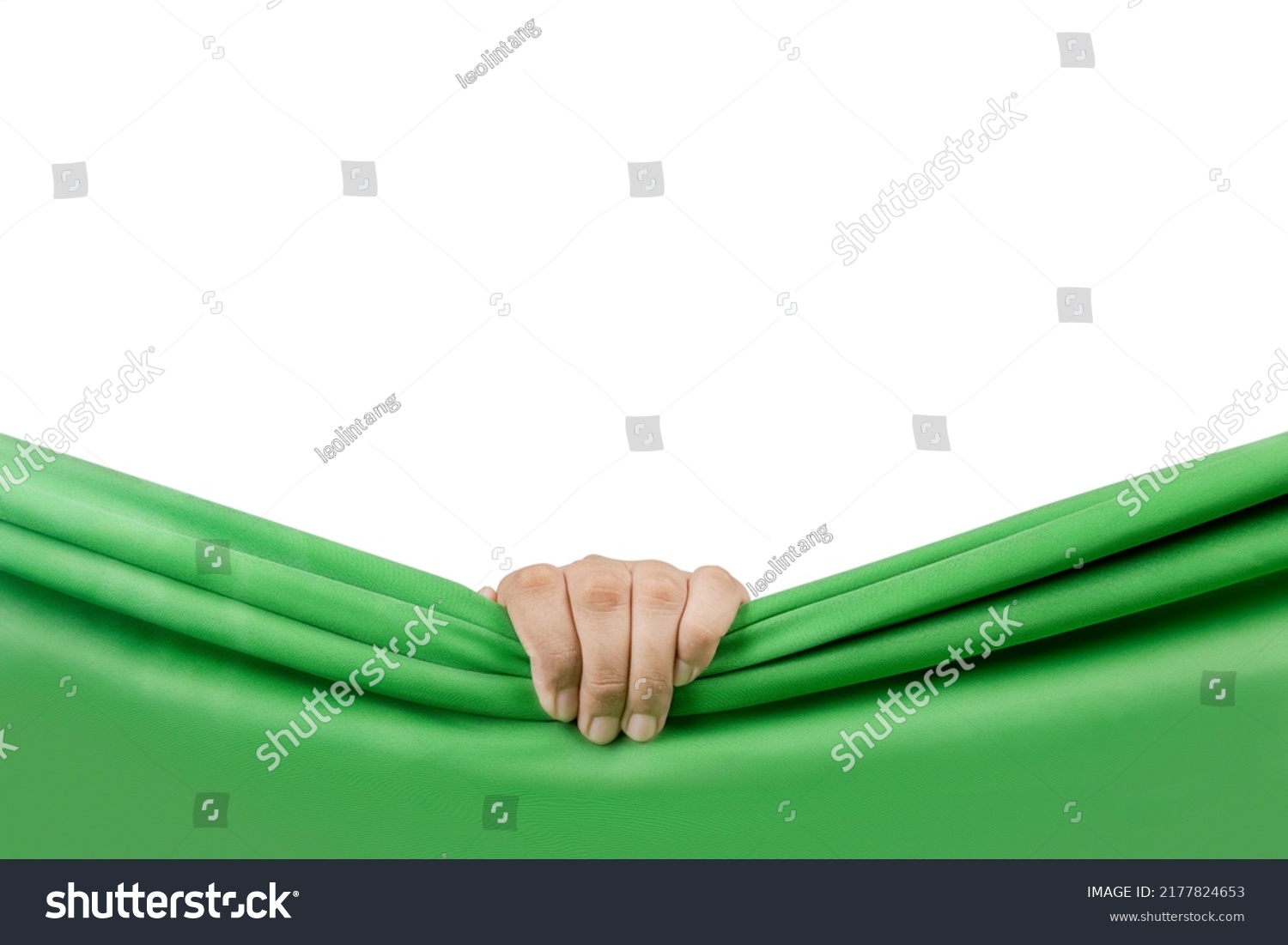 Human hand opening green curtain with white background #2177824653