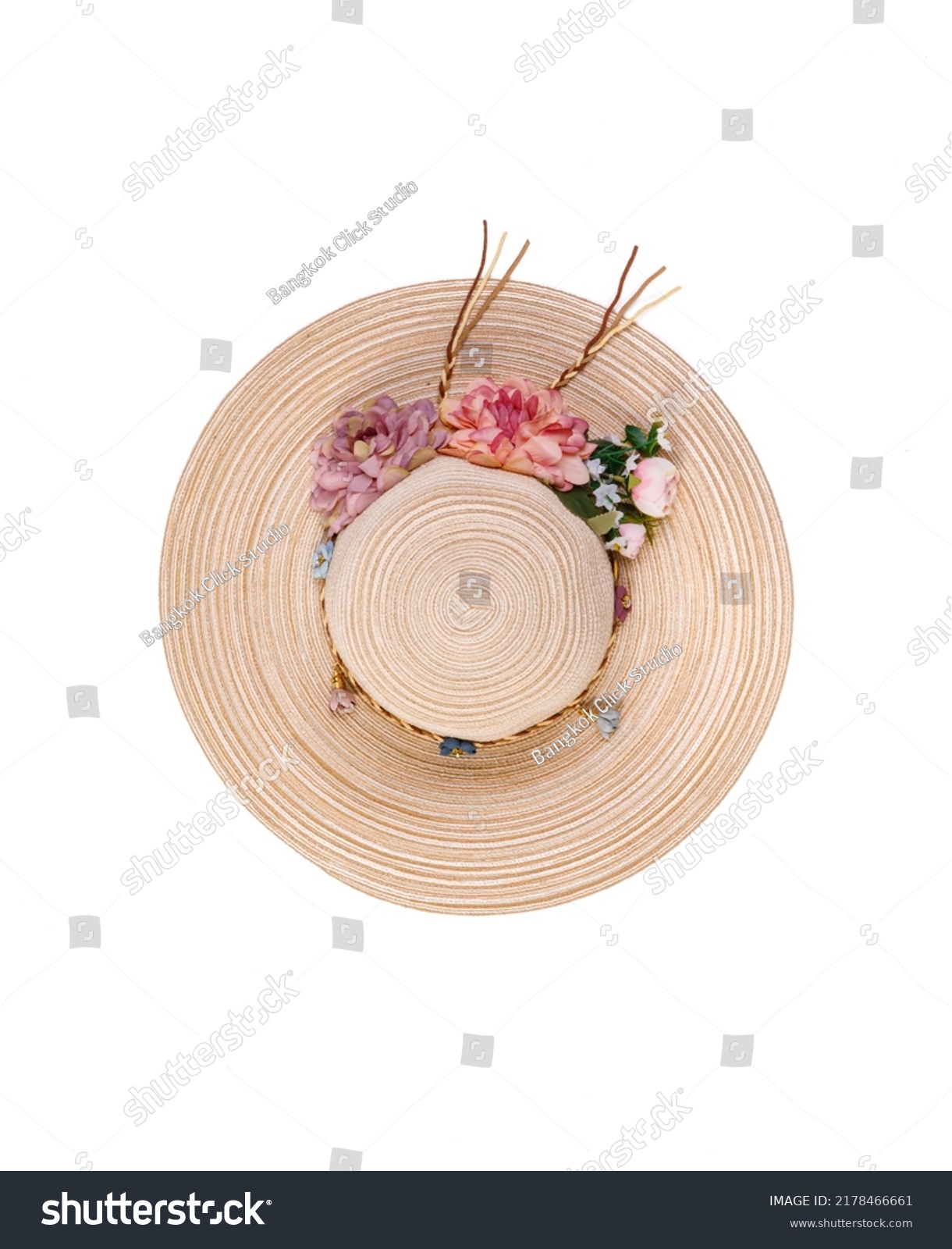Closeup studio top view isolated shot of beautiful fashionable Asian modern classic style lady woman wicker woven weaving rattan handmade handicraft hat with dry flowers hatband on white background. #2178466661