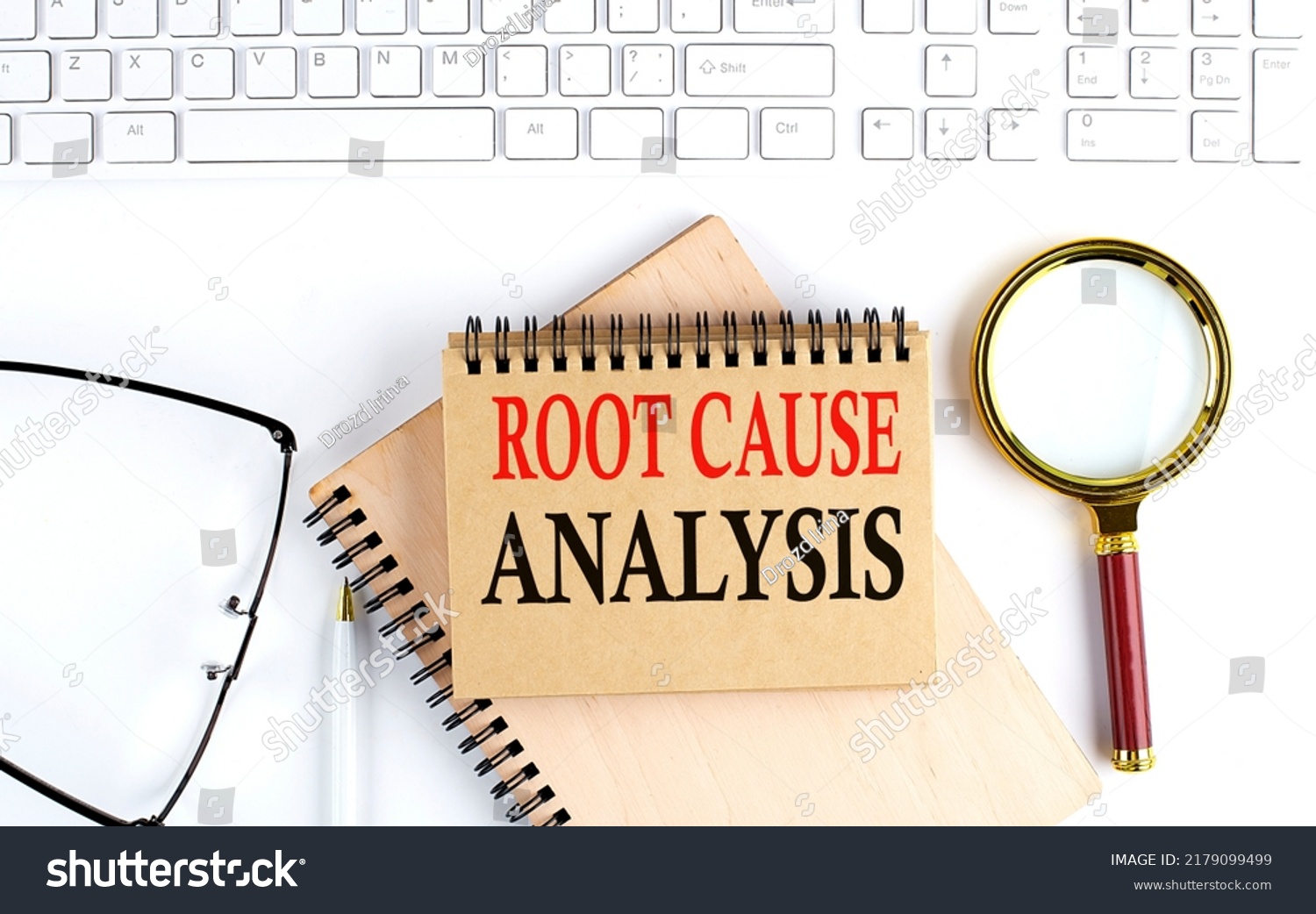 Root Cause Analysis written on paper note pinned with red thumbtack on wooden board. Business conceptual Image #2179099499