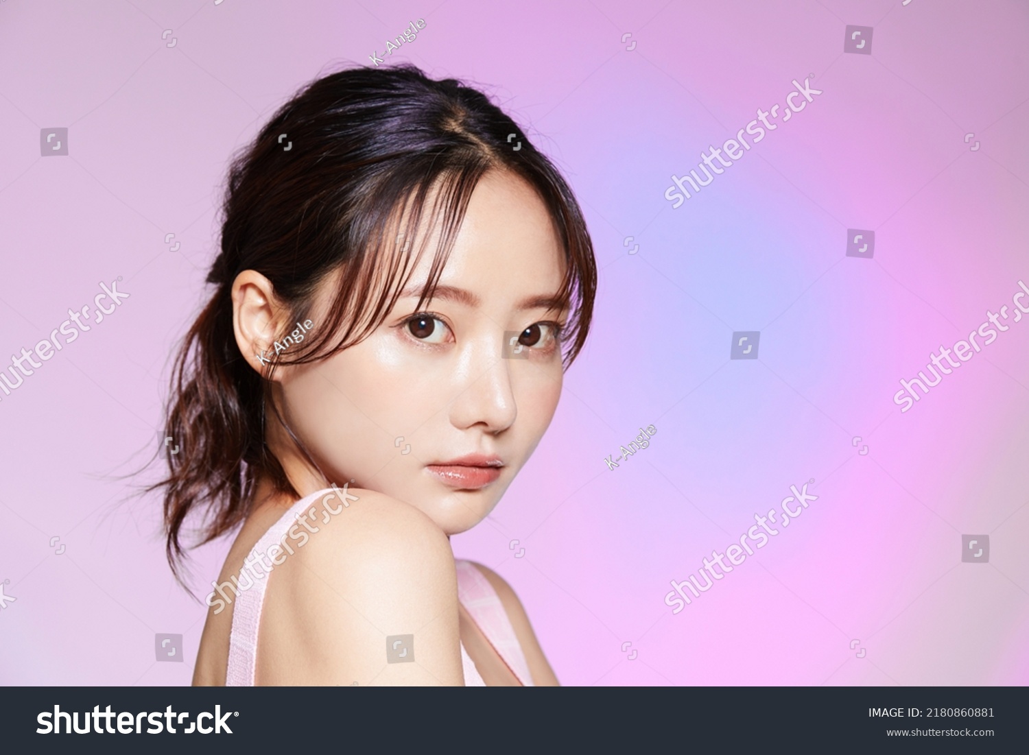 Beauty portrait of young Asian woman on colorful background #2180860881