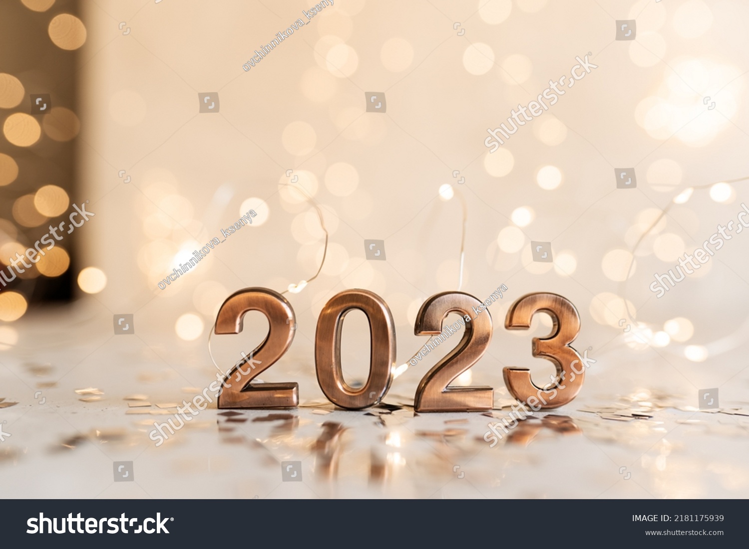 happy new year 2022 background new year holidays card with bright lights,gifts and bottle of hampagne #2181175939