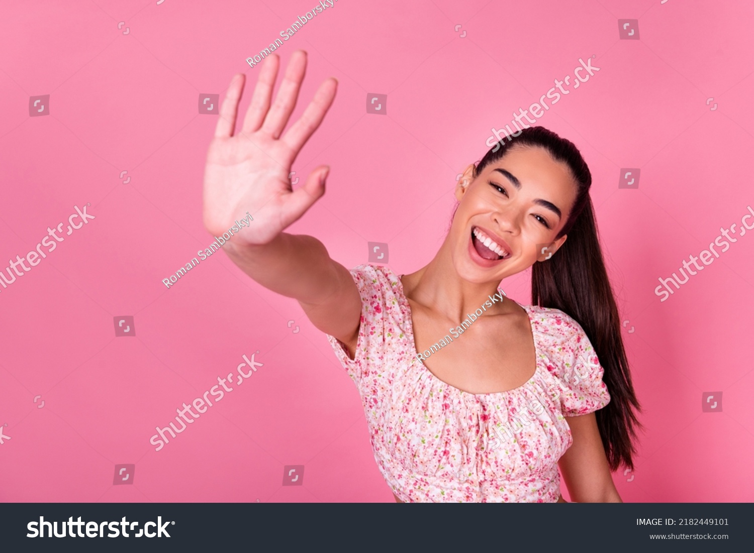 Portrait of pretty excited girl arm palm give high five toothy smile isolated on pink color background #2182449101