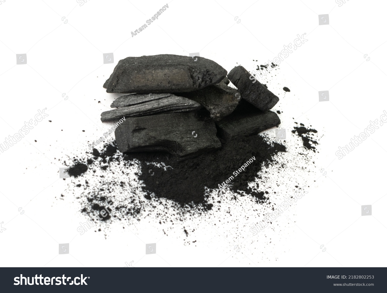 Activated carbon isolated. Active coal pile, absorbent charcoal closeup, graphite filter, absorb activated coal on white background #2182802253