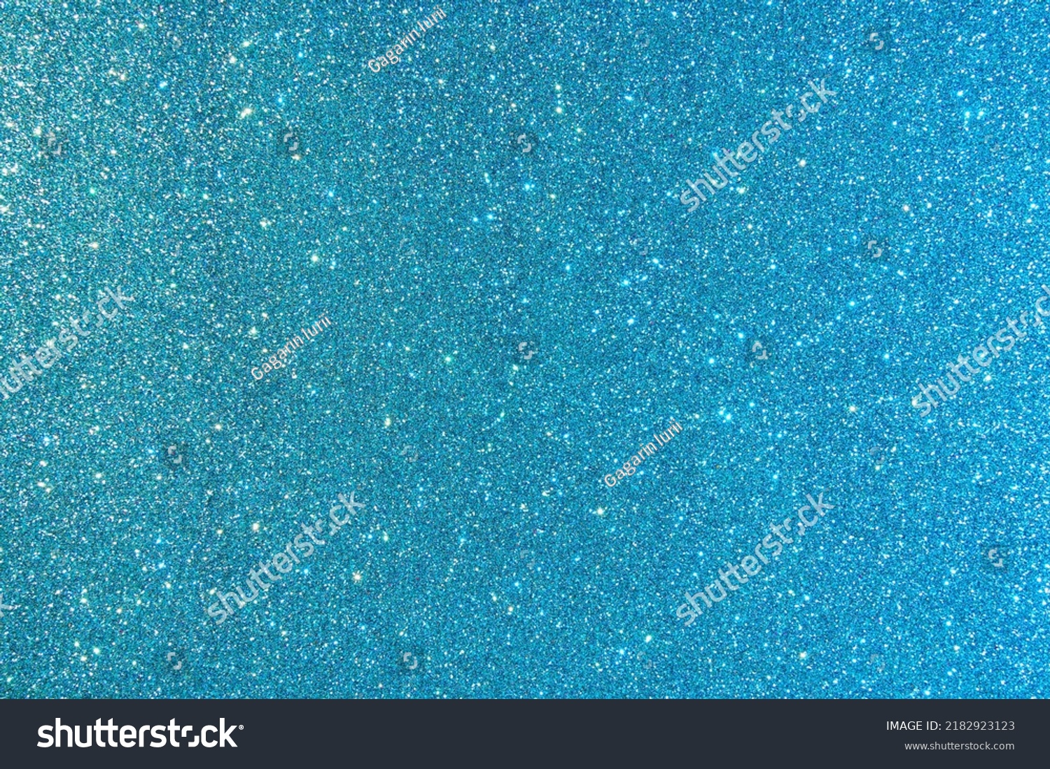 Background with sparkles. Backdrop with glitter. Shiny textured surface. Dark cyan. Mixed neon light #2182923123