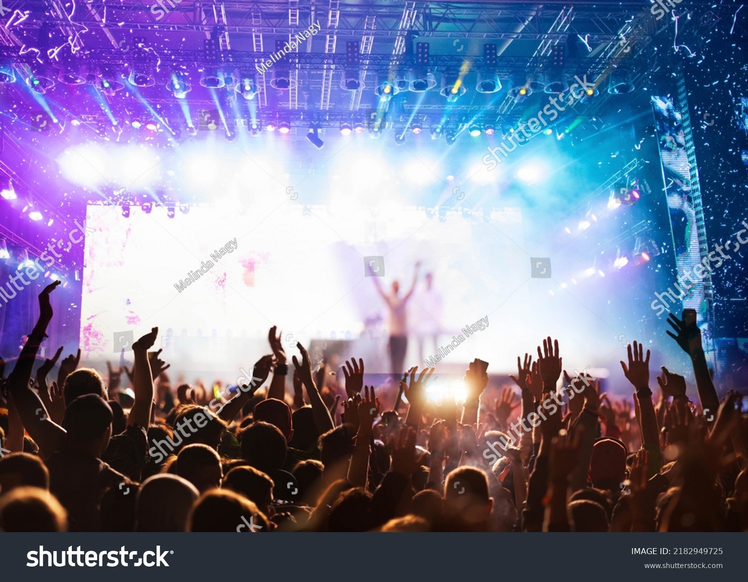 crowd partying stage lights live concert summer music festival #2182949725