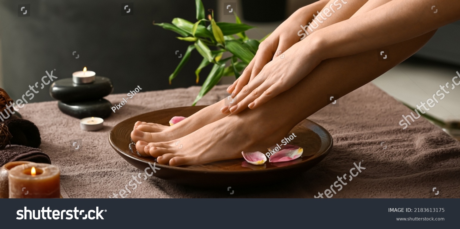Young woman undergoing spa pedicure treatment in beauty salon #2183613175