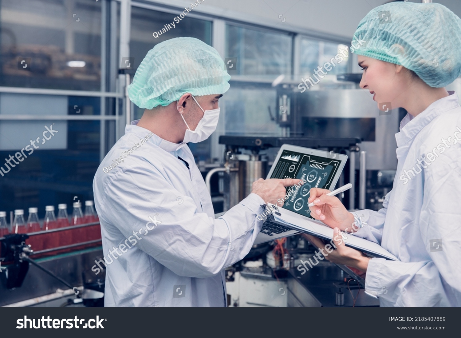 Food and Drink factory worker working together with hygiene monitor control mix ingredients machine with laptop computer #2185407889