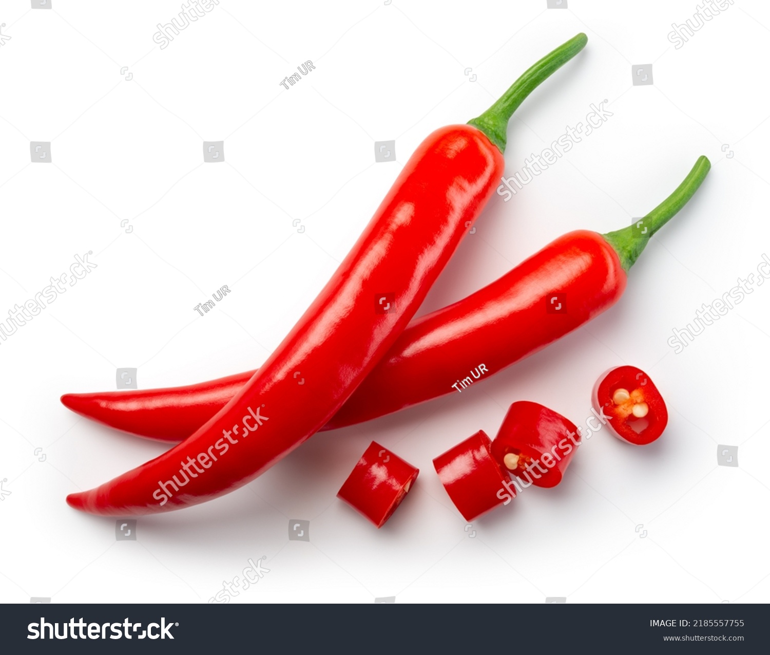 Chili pepper isolated. Chilli top view on white background. Whole and cut red hot chili peppers top. With clipping path. #2185557755