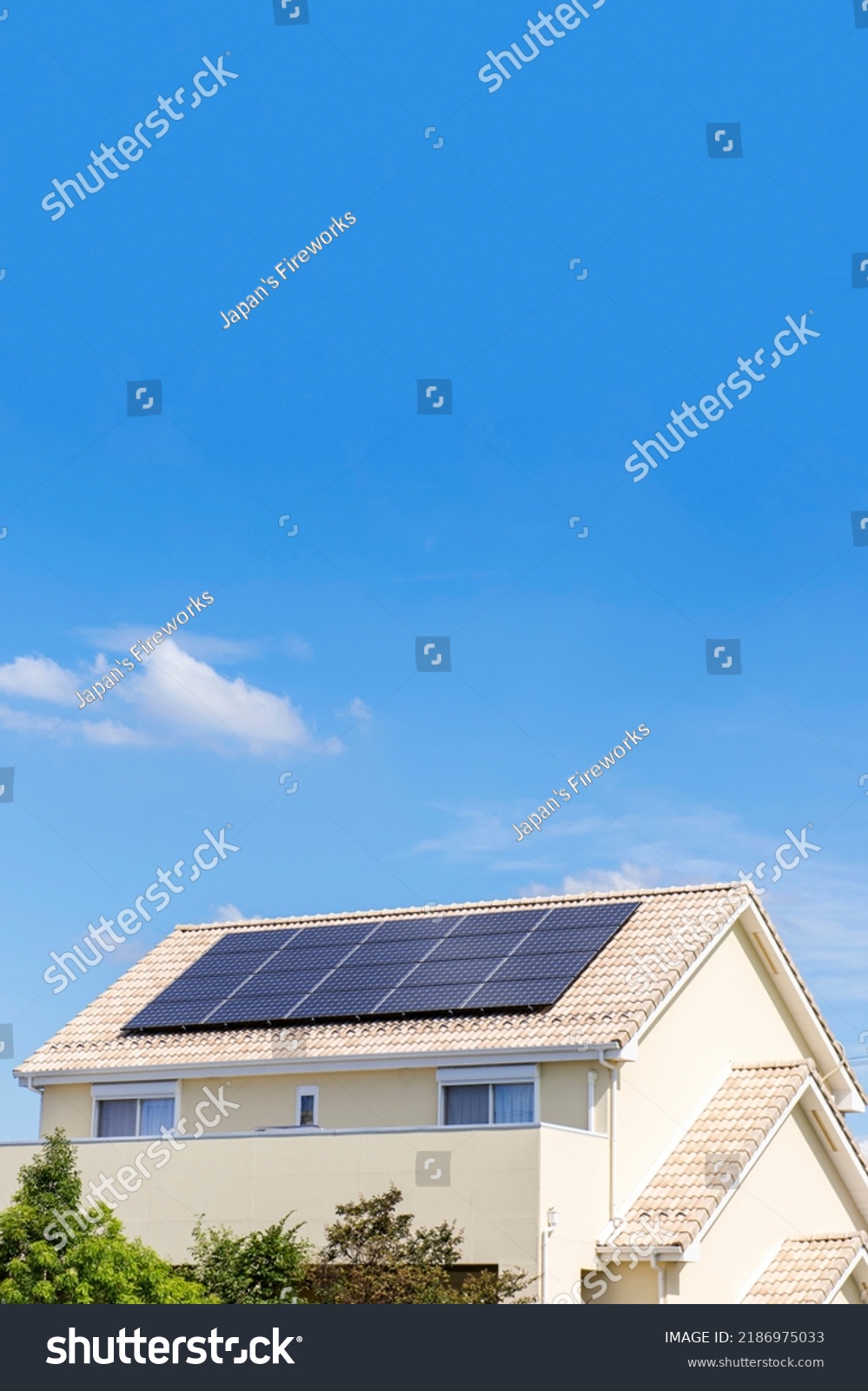 A house with solar panels on the roof.
Environmentally ecology concept. #2186975033