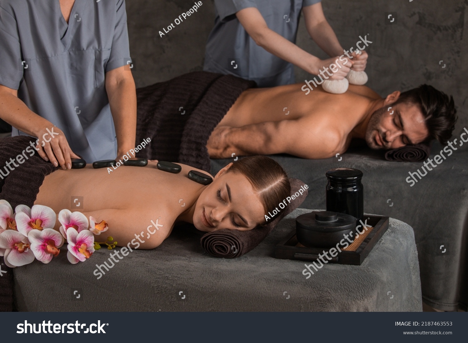 Beautiful couple spend time together enjoying romance massage, spa resort. #2187463553