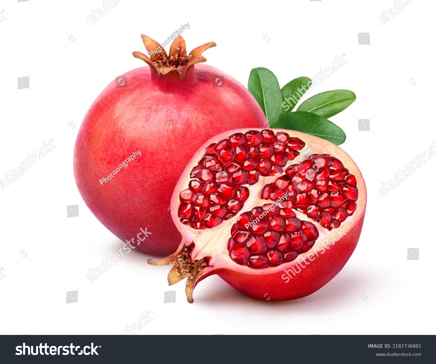 Fresh ripe pomegranate with cut in half isolated on white background. Clipping path. #2187736881