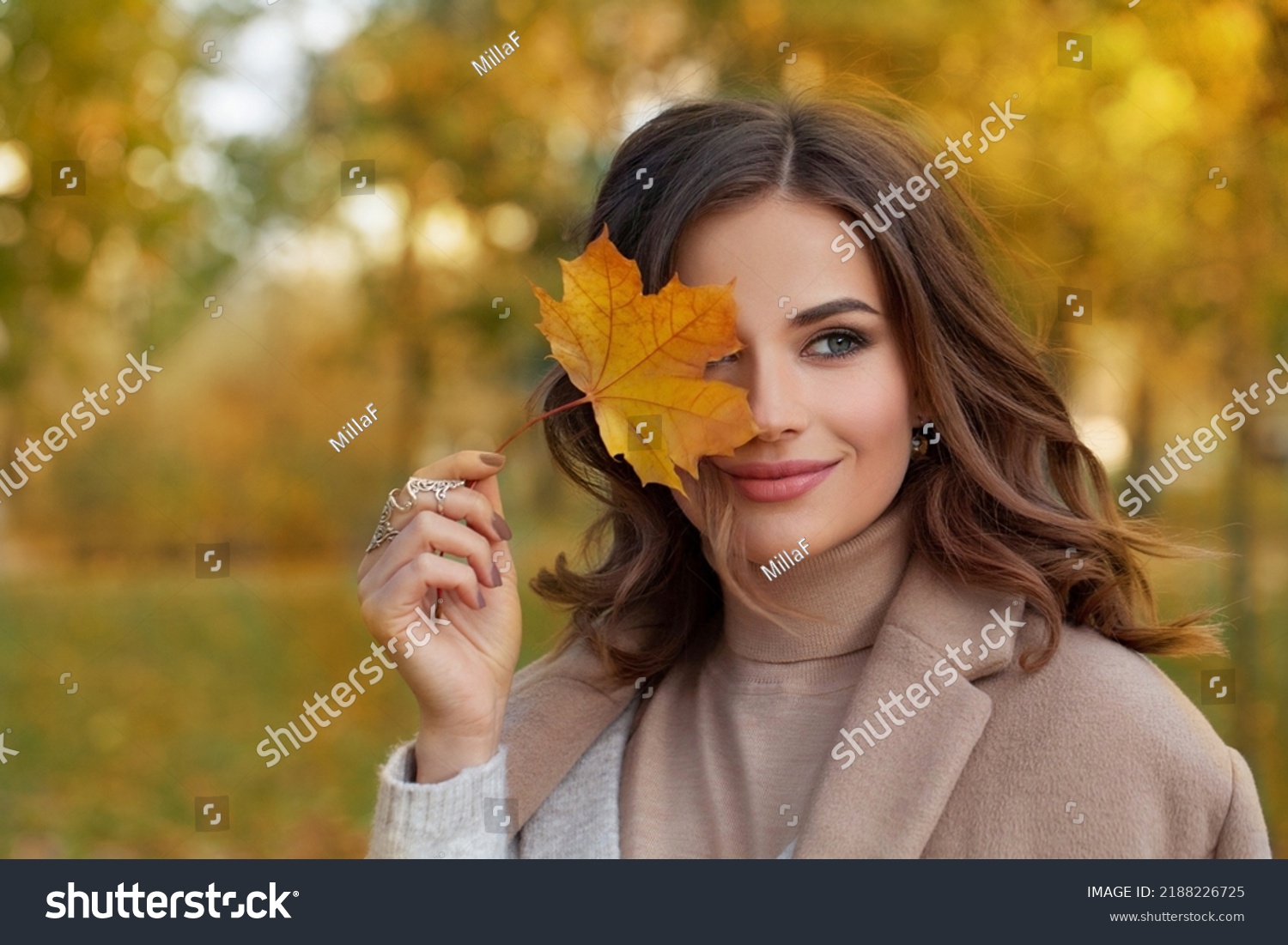 Outdoor atmospheric lifestyle portrait of young beautiful lady. Warm autumn #2188226725