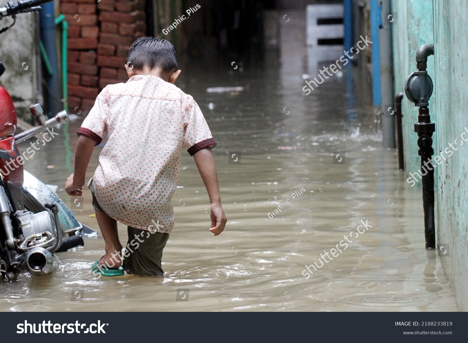 Pakistan Flood stock image 2022. A flood in a city and streets. Pakistan Flood 2022 stock image. Flood in Pakistan 2022 image. #2188233819