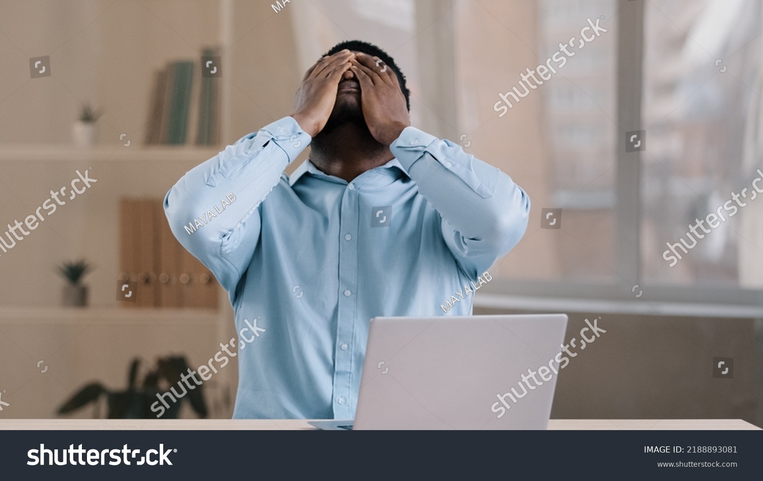 Frustrated shocked african businessman american adult man student work on computer make error mistake feels stress upset with bad news failure e-commerce exam lost internet connection lose online #2188893081