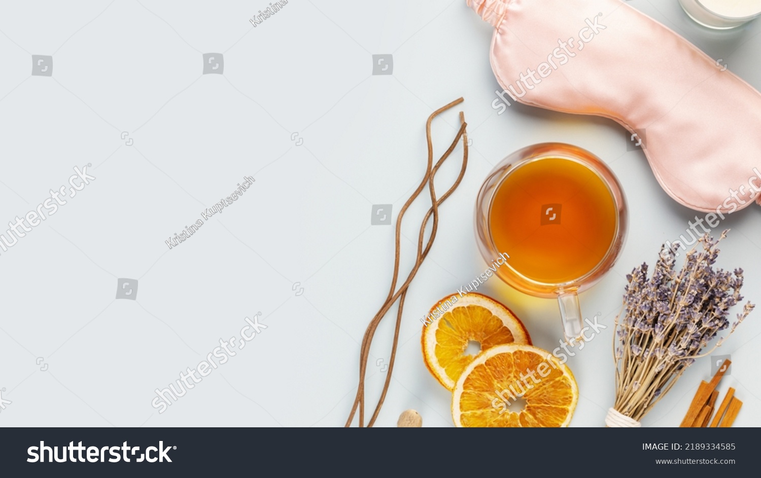 Concept of Me time and no depression. Self-care flat lay with sleep mask, lavender flower, herbal tea, dry fruits and aroma sticks on a blue background with copy space. Healthy sleep is healthy life #2189334585
