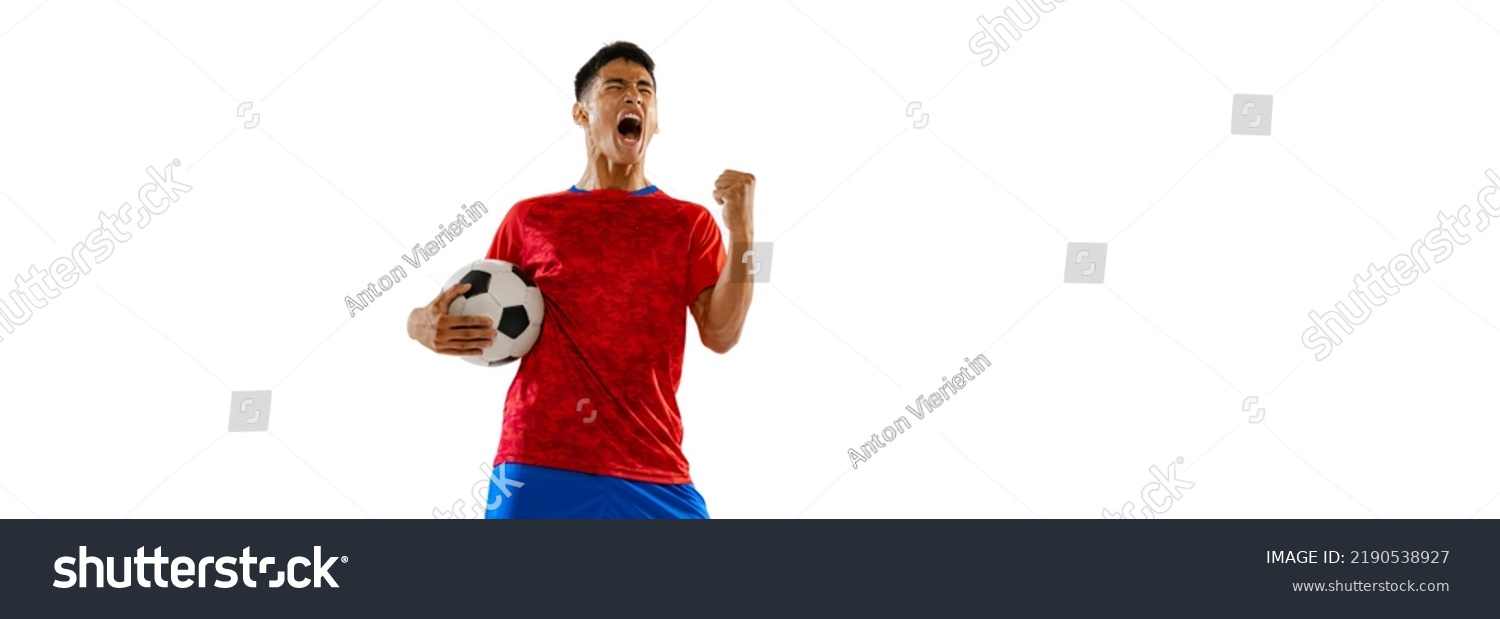 Portrait of young expressive man, football player posing isolated over white studio background. Looks extremely motivated. Concept of sport, team game, action, motion. Copy space for ad, poster #2190538927