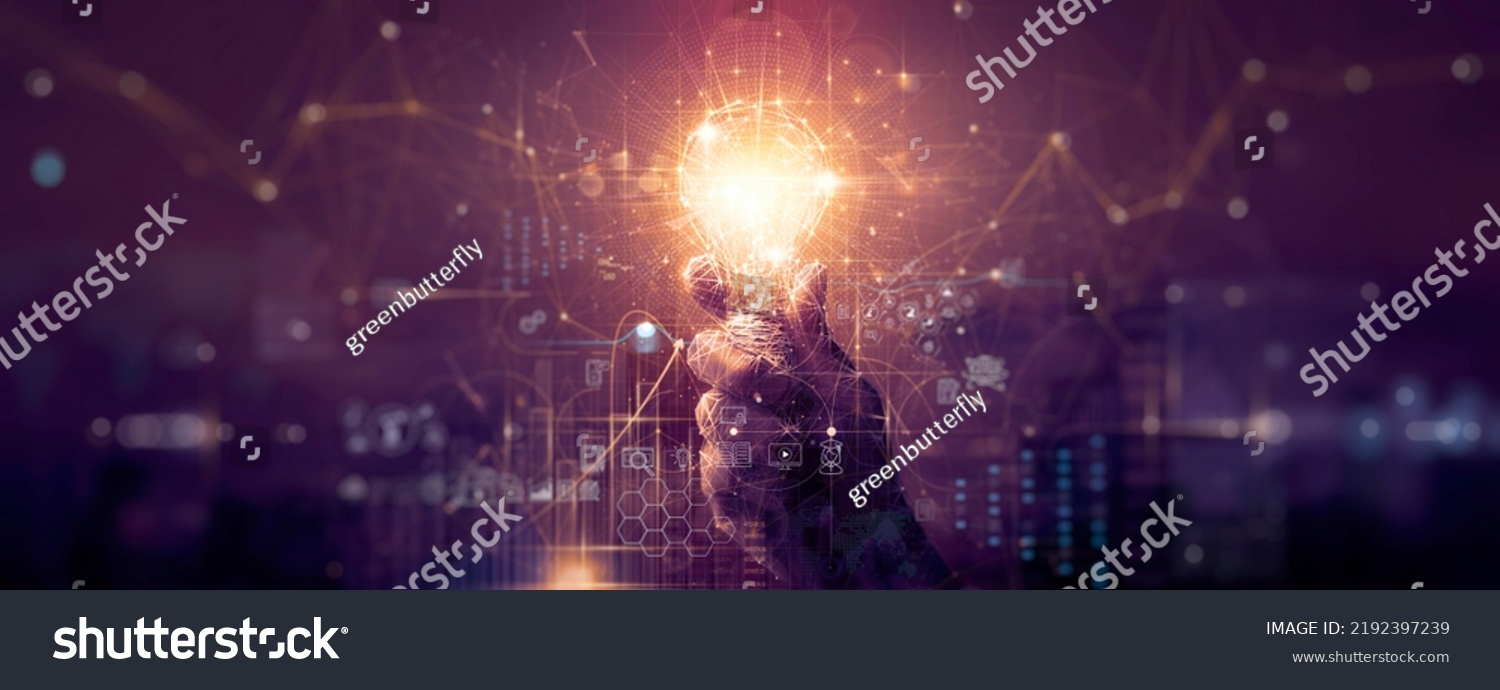 Businessman hand holding creative light bulb with industry network,analysis solution and development marketing network icons  planning strategy, Modern business, Innovative of new ideas. #2192397239