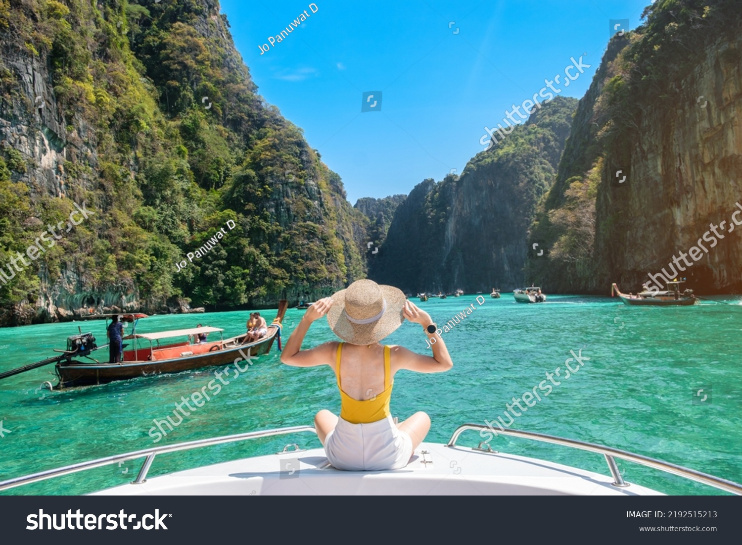 Woman tourist on boat trip, happy traveller relaxing at Pileh lagoon on Phi Phi island, Krabi, Thailand. Exotic landmark, destination Southeast Asia Travel, vacation and holiday concept #2192515213