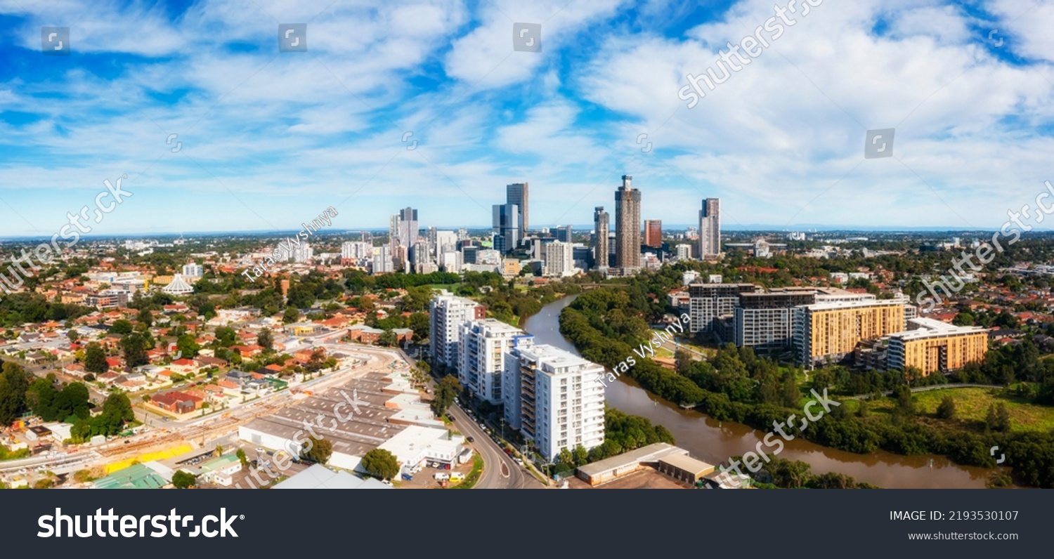 Short aerial cityscape skyline panorama of Parramatta CBD on river in Western Sydney. #2193530107