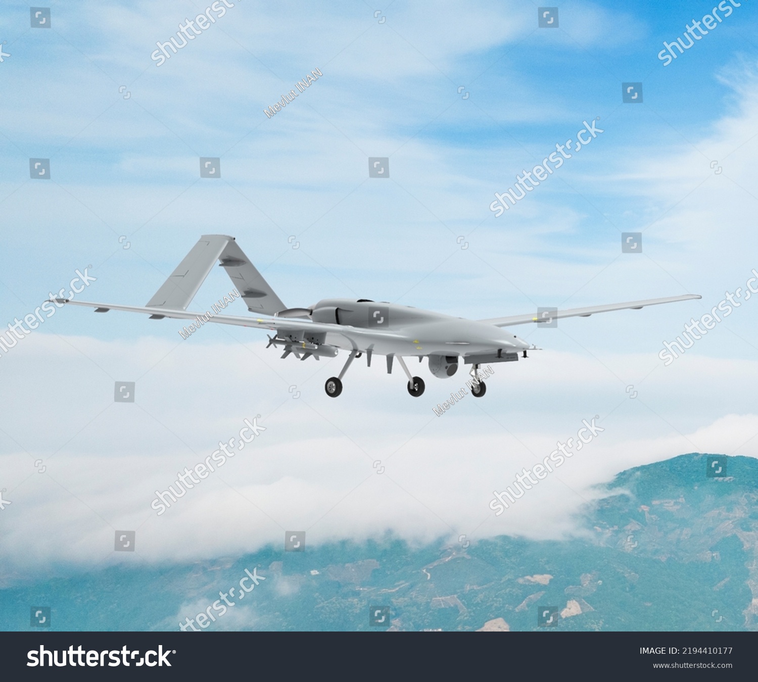 Bayraktar TB2 Unmanned aerial vehicle gliding through the clouds. Bayraktar TB2 combat drone in flight over the clouds. #2194410177