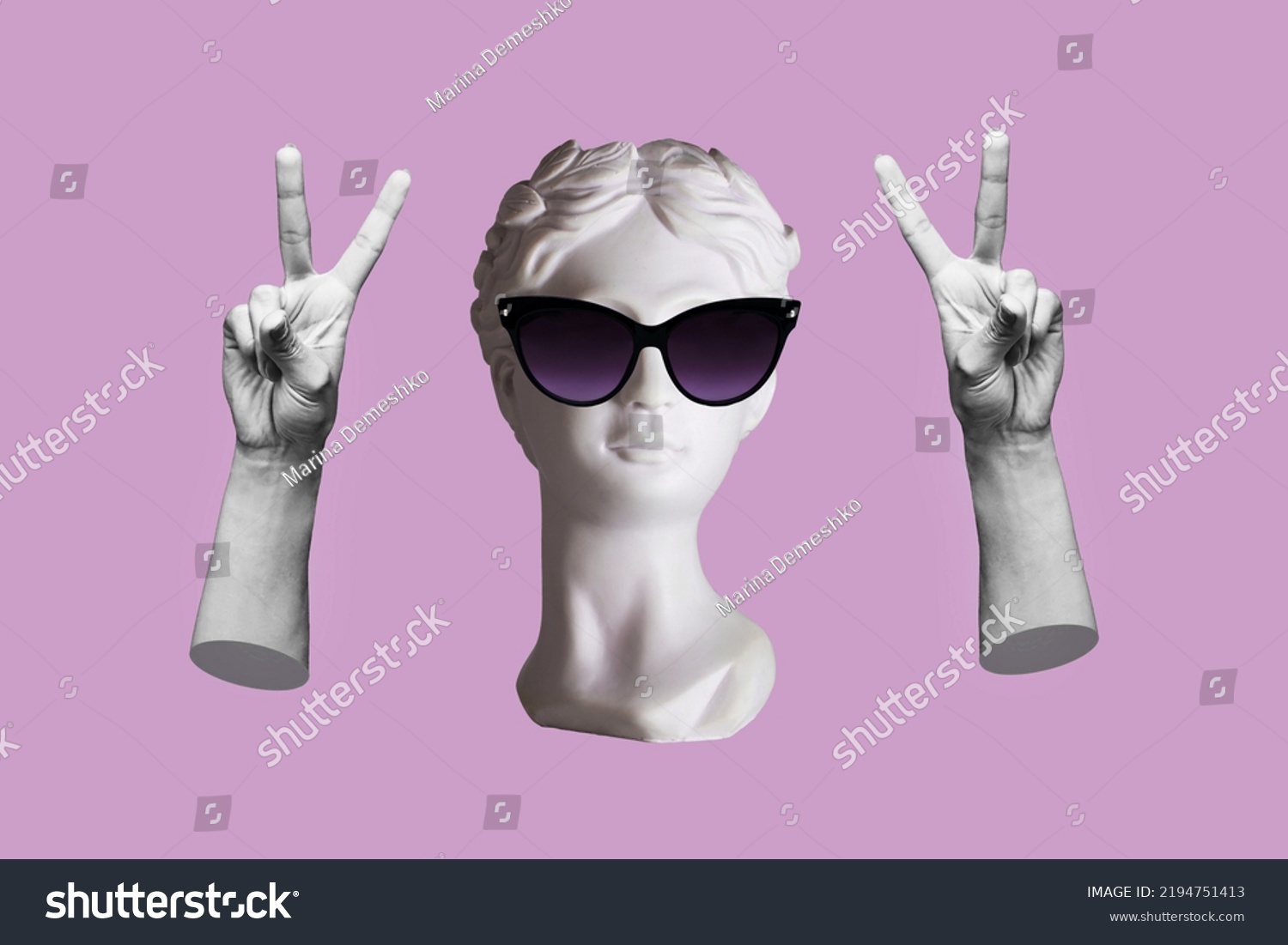 Antique female statue's head in black sunglasses showing a peace gesture with hands isolated on a purple color background. Trendy collage in magazine surreal style. 3d contemporary art. Modern design #2194751413