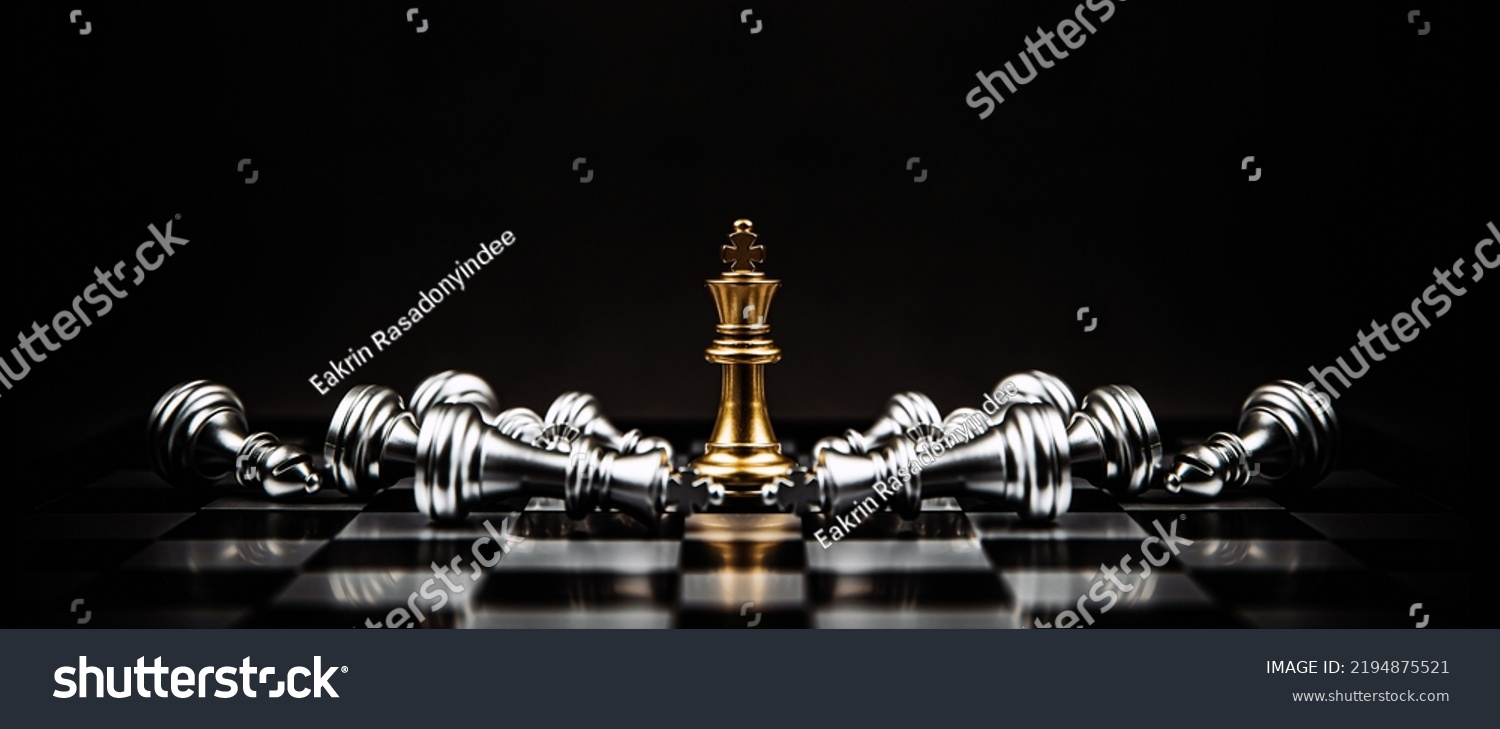 King chess pieces stand on falling chess concepts of competition challenge of leader business team or teamwork volunteer or wining and leadership strategic plan and risk management or team player. #2194875521