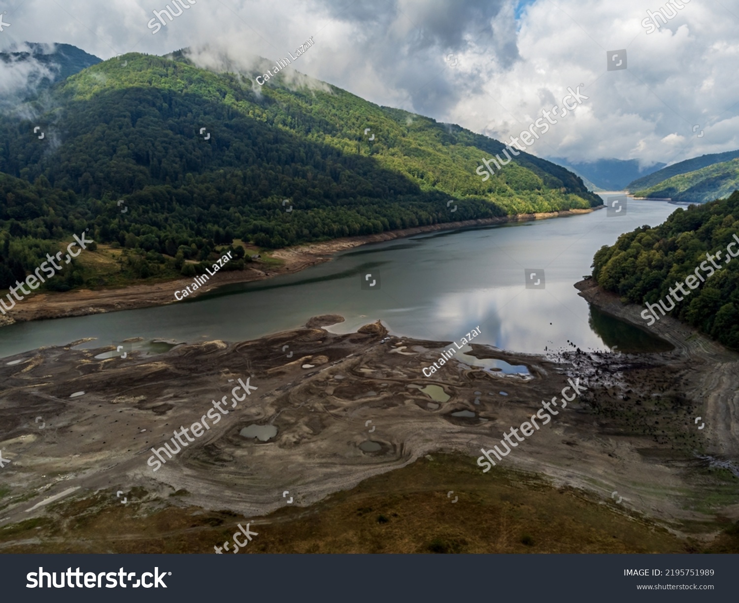 Aerial view of the Poiana Marului Lake shore during the summer drought who has hit Europe. Photo taken on 31st of July 2022 in Poiana Marului reservation, Caras-Severin County, Romania. #2195751989