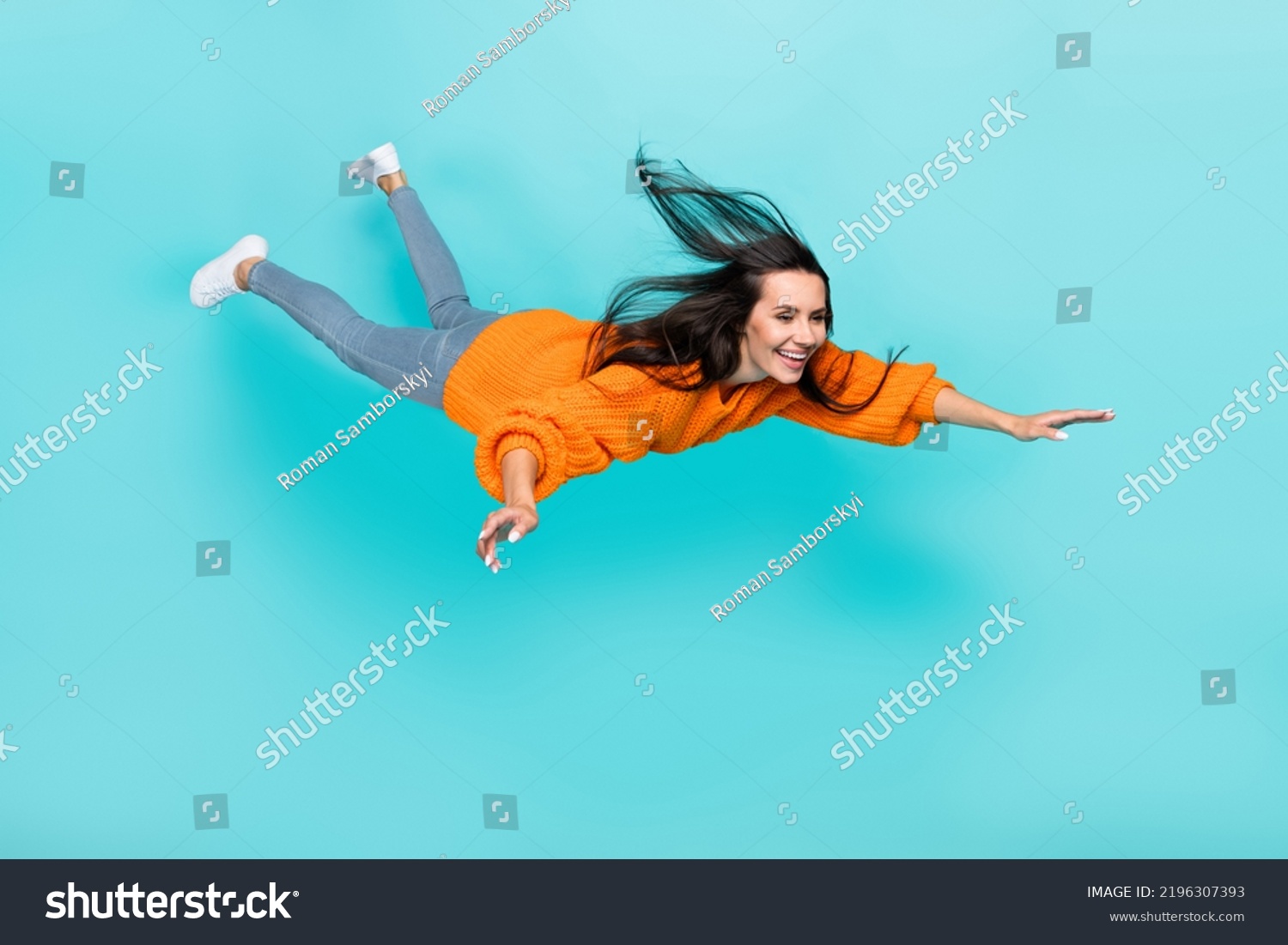 Full length photo of pretty satisfied person fly falling toothy smile isolated on teal color background #2196307393
