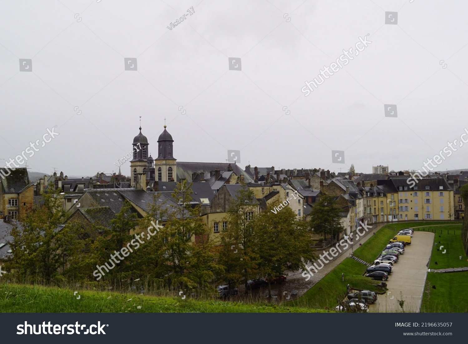 The view of streets in the French city of Sedan from the wall of the castle of Sedan which is located in the middle of the city, on a rainy autumn day. #2196635057
