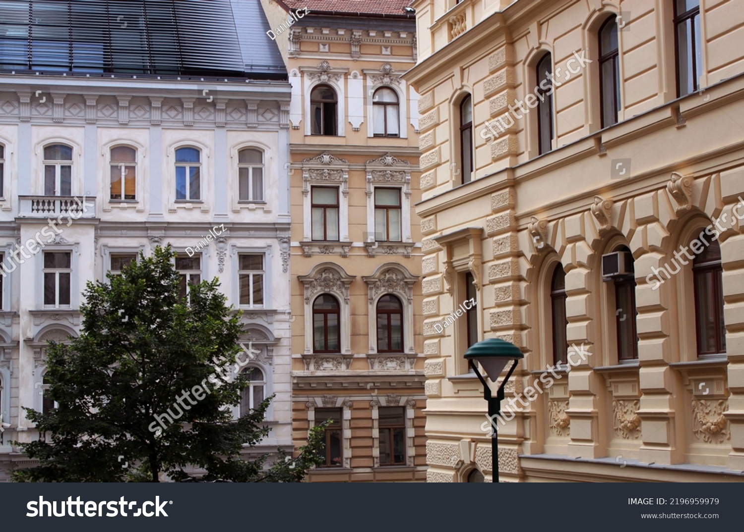 Facade of historical buildings in the old town of Vienna, Austria, Central Europe. Exterior view of heritage houses. Statues, sculptures, figures, ornaments, architectural background. #2196959979