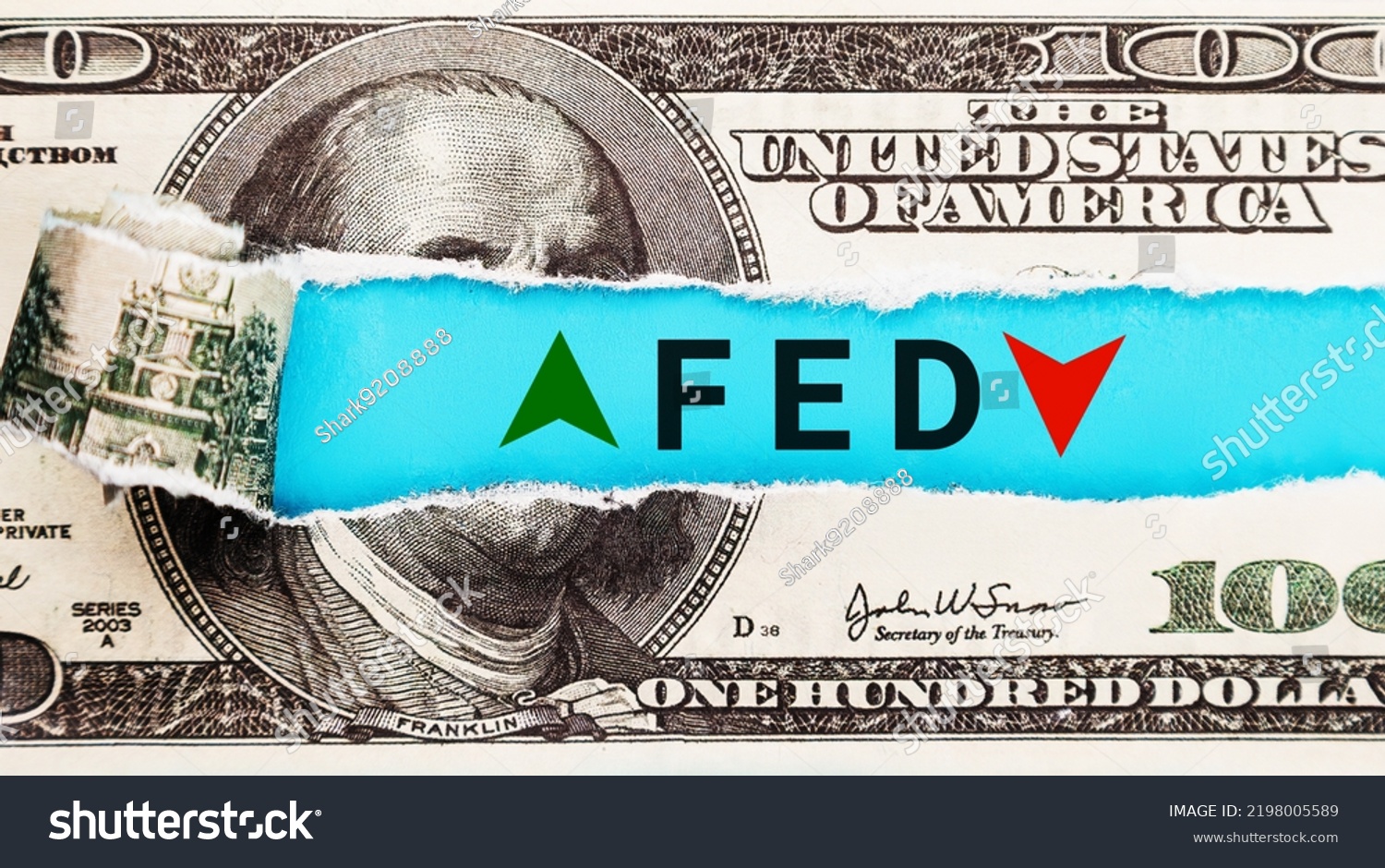 The Federal Reserve FED wording with up and down arrow on USD dollar banknote for Federal reserve increase and decrease interest rate control which effect to America and world economic growth concept. #2198005589