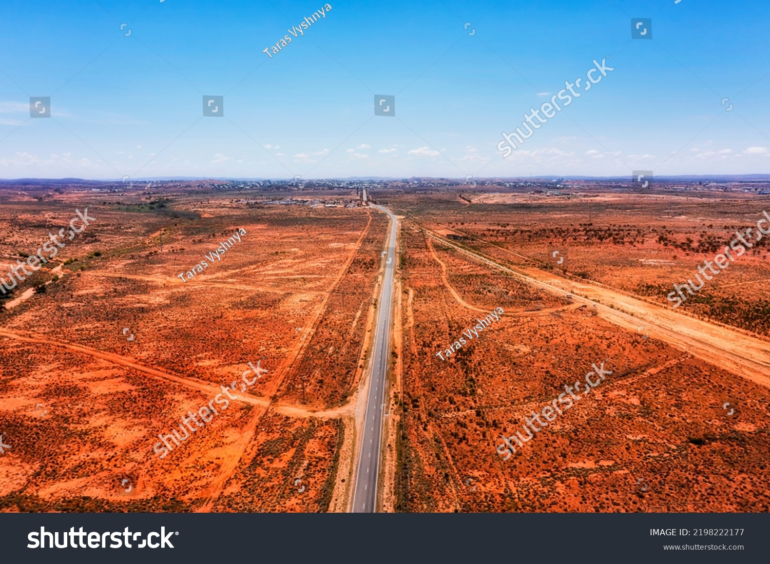 Silver city highway from Adelaide to Broken hill at entrance to Broken Hill city in australian red soil outback. #2198222177