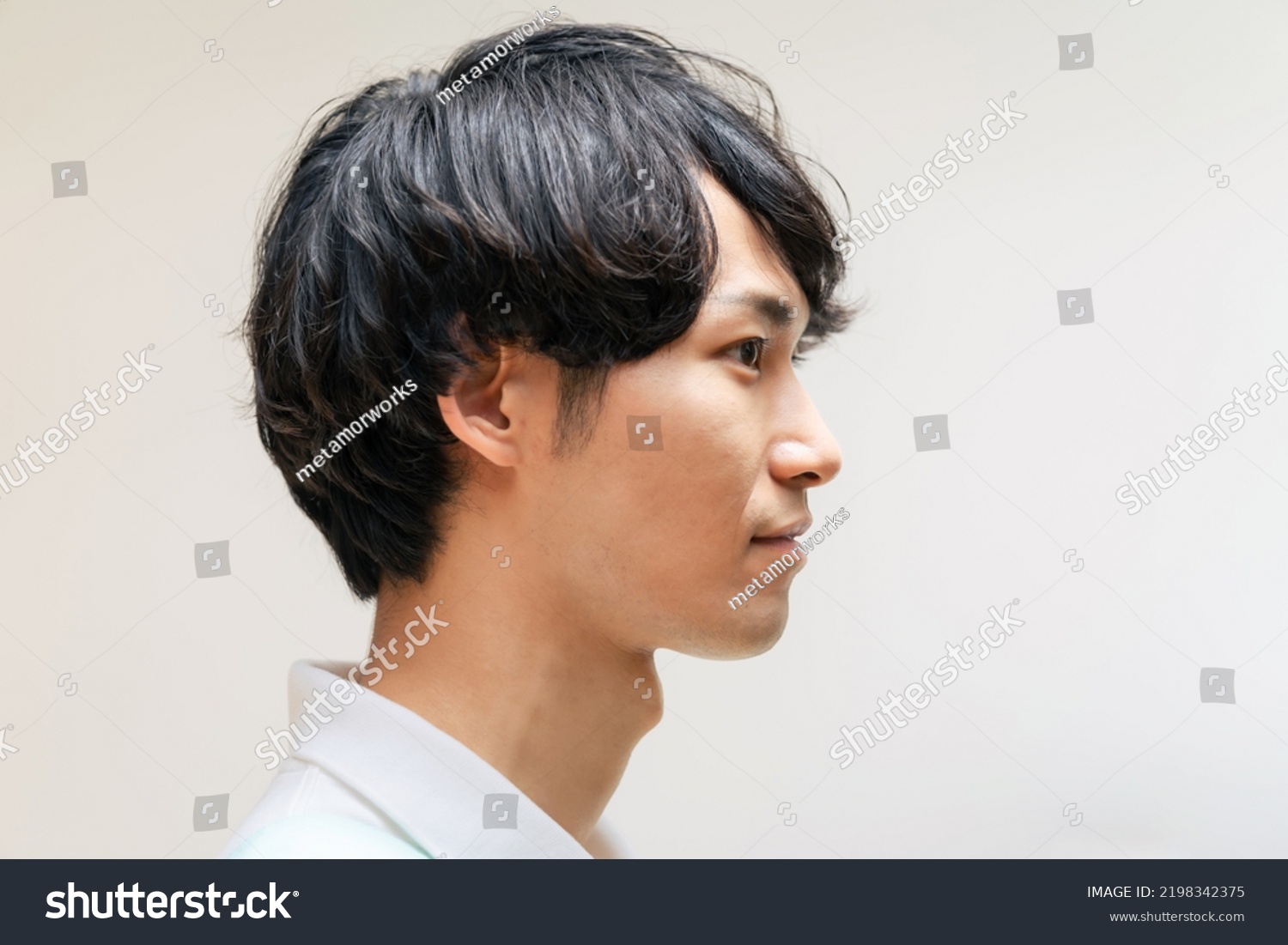 Profile of Asian man. Portrait. Side view. #2198342375