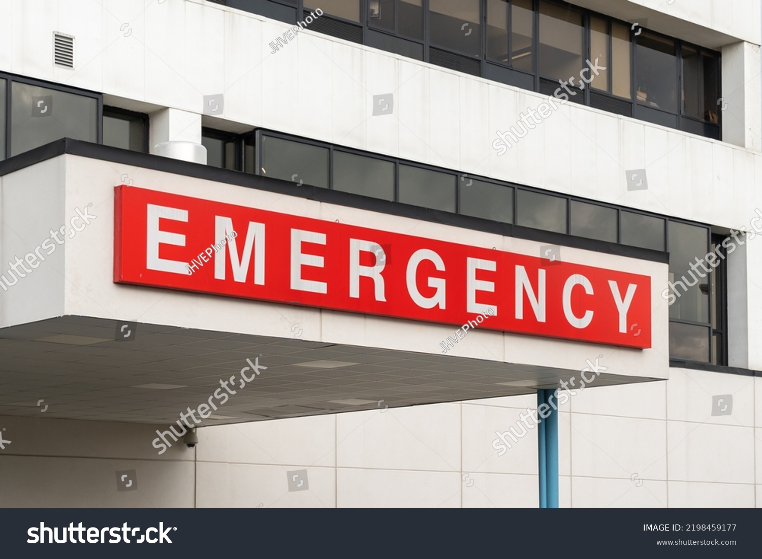 Emergency sign above the entrance at a hospital in the United States.   #2198459177