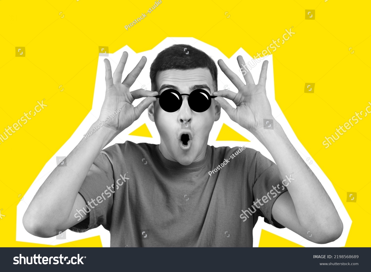 Excited young man in t-shirt touching his eyeglasses, mouth open, amazed guy looking at amazing offer or deal, yellow studio background, collage, black and white people on colorful backgrounds #2198568689