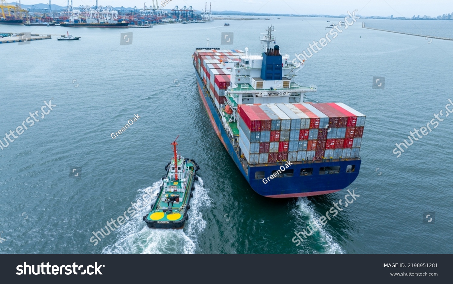 stern of Cargo container Ship in the ocean sea concept logistic transportation export to customs forwarding logistics service. Container on Bulk ship #2198951281