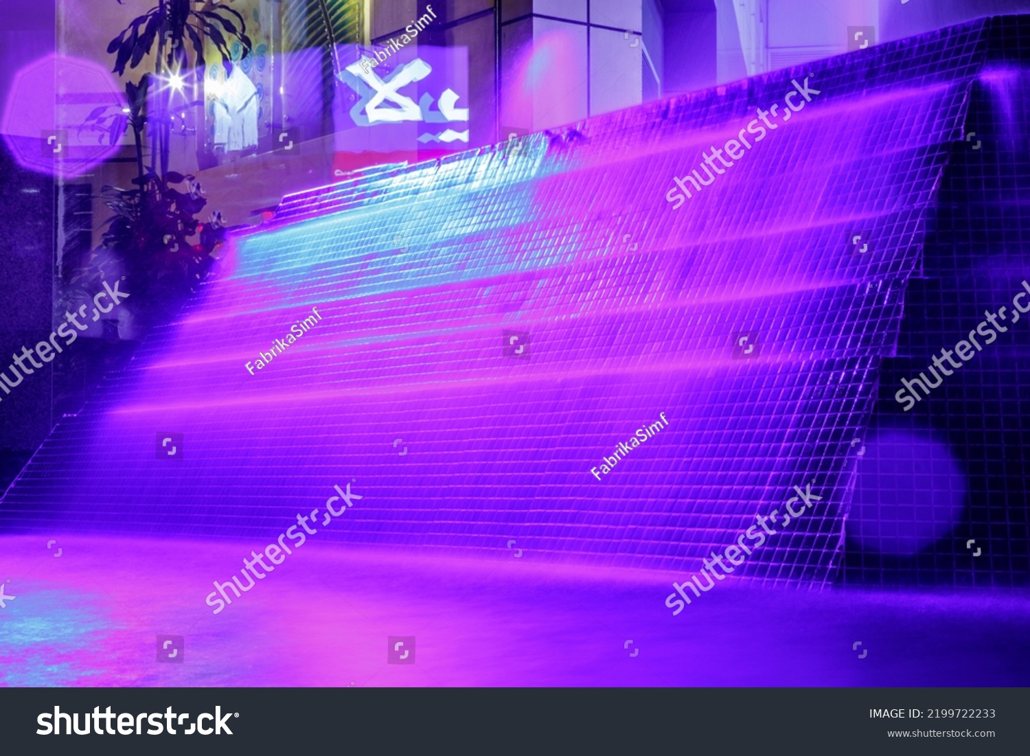 Beautiful purple illuminated fountain at night in Dubai #2199722233
